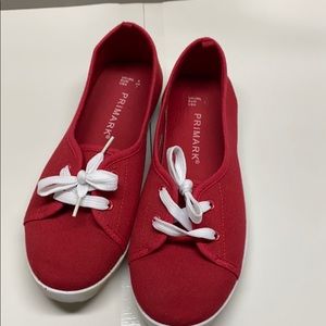 Primark red canvas sneakers